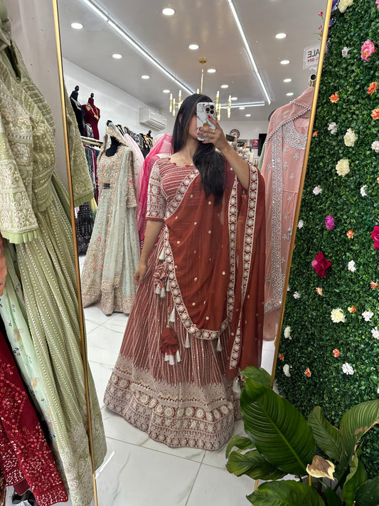 Rusty orange heavy embroidered lehenga