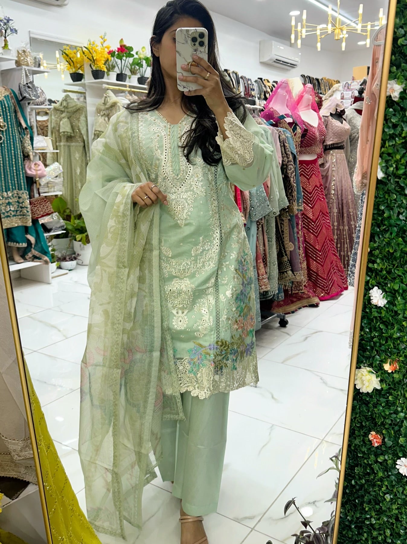 Mint fancy chikankari embroidered lawn suit.