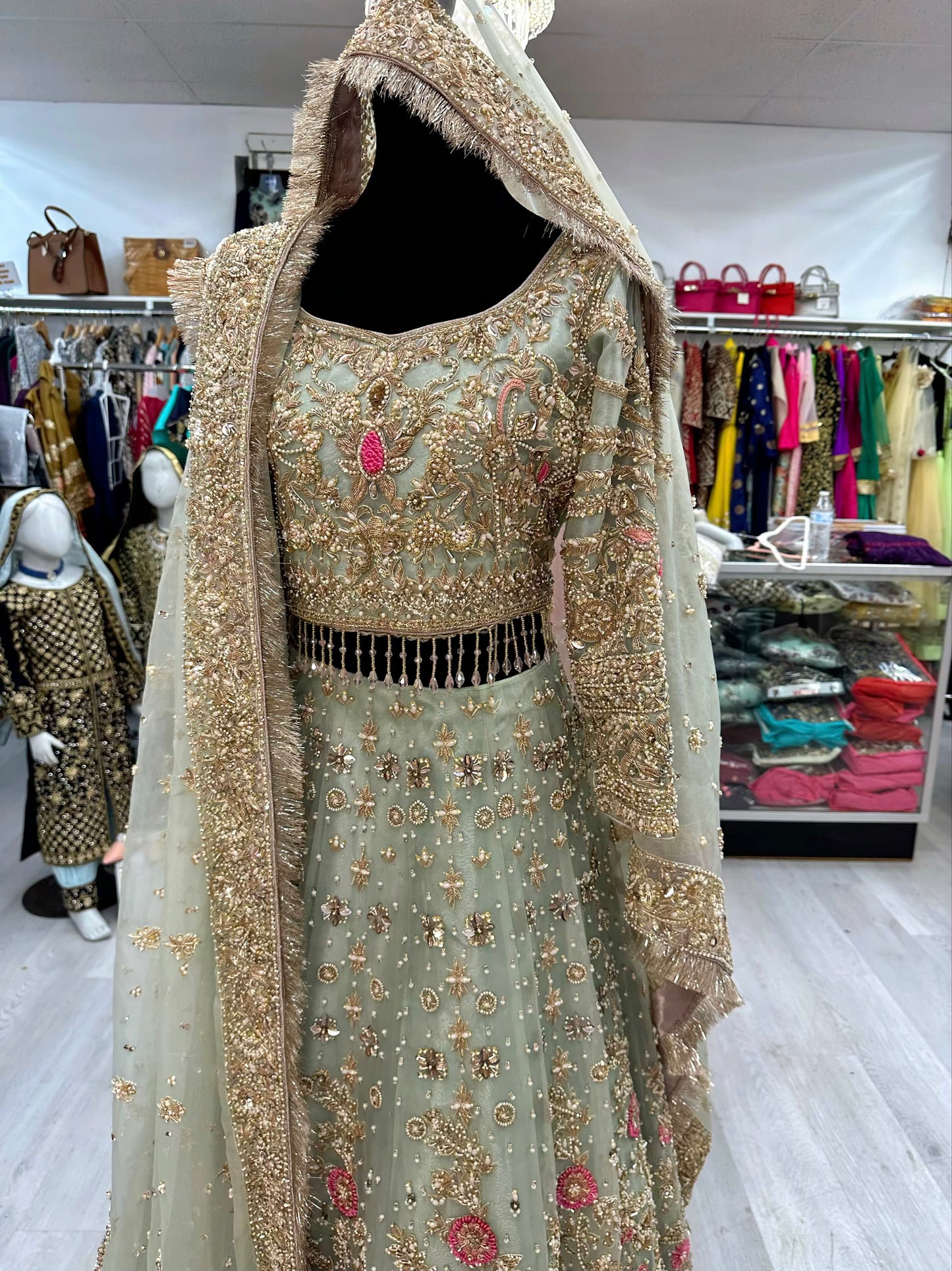 Pastel mint blue heavy jewelry work bridal lehenga
