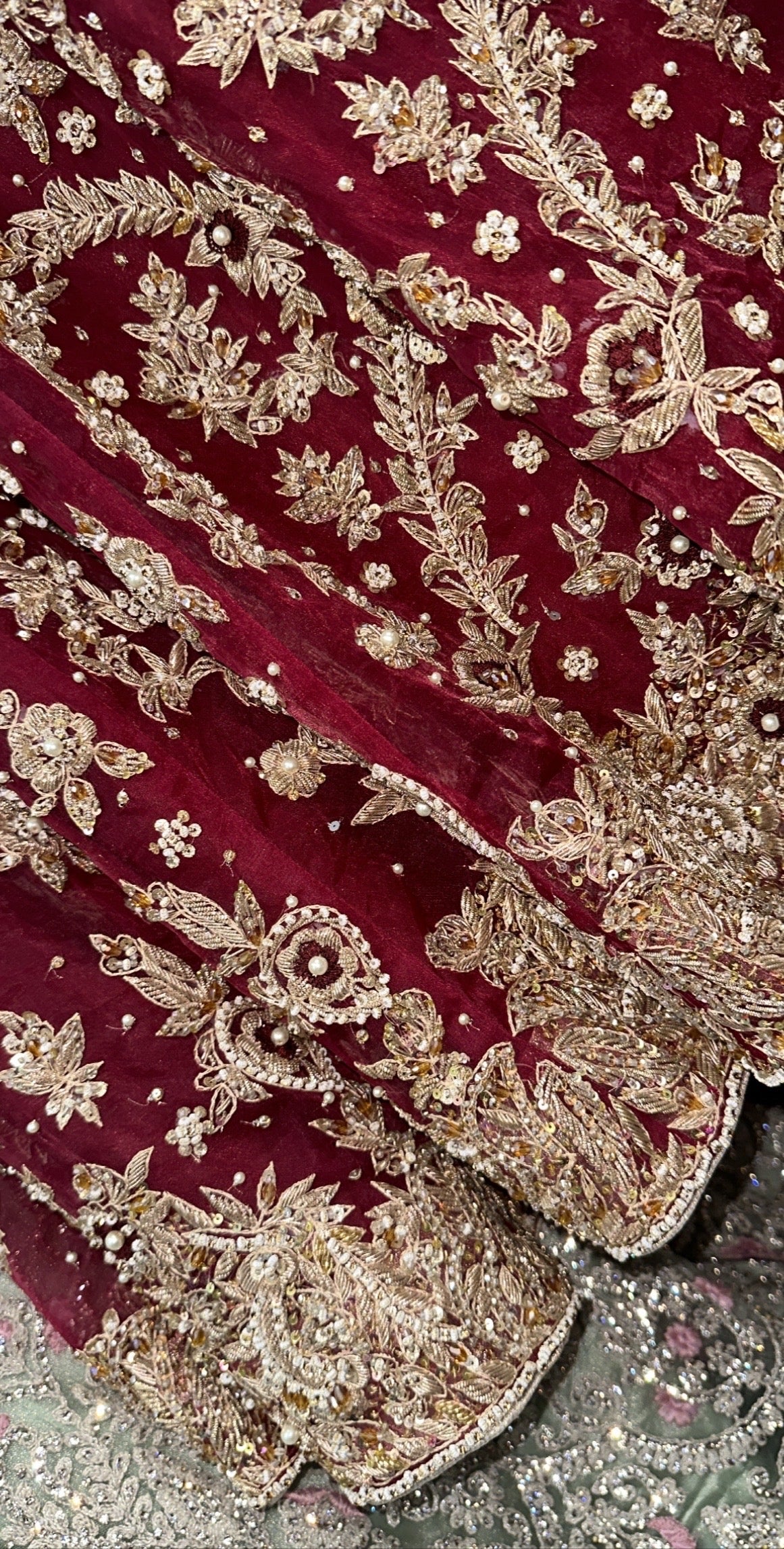 Maroon organza hand work bridal lehenga