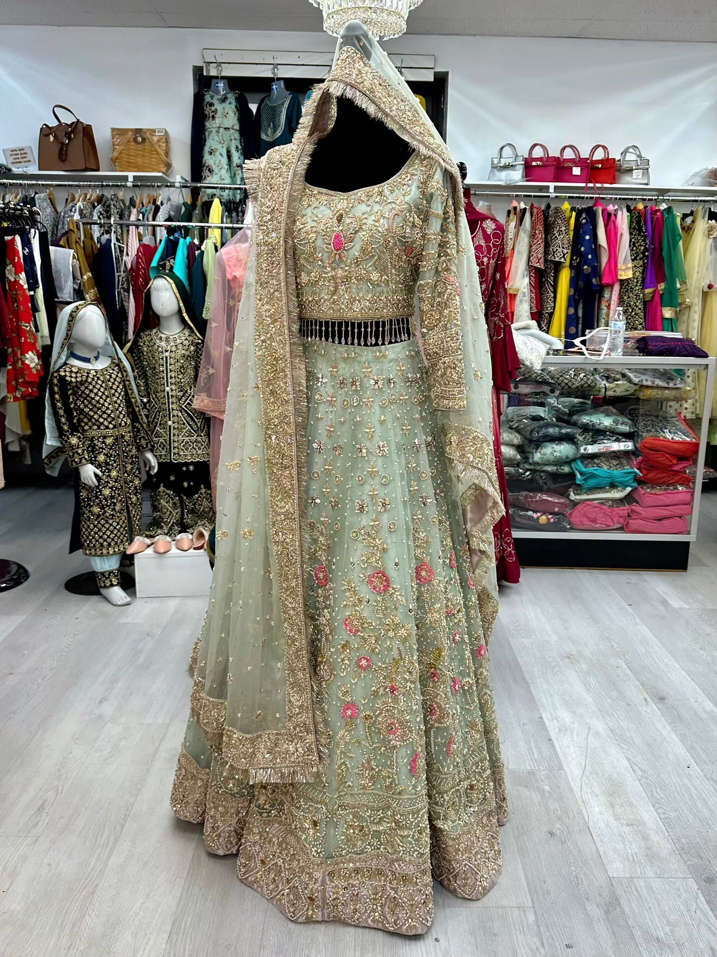 Pastel mint blue heavy jewelry work bridal lehenga