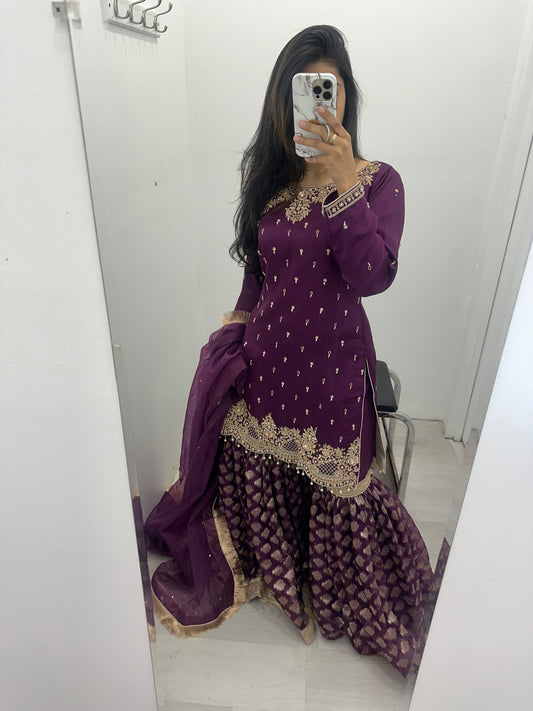 Party wear gharara in heavy hand work. Kameez shimmer organza with soft organza duppata & brocade zuthe katan gharara pant