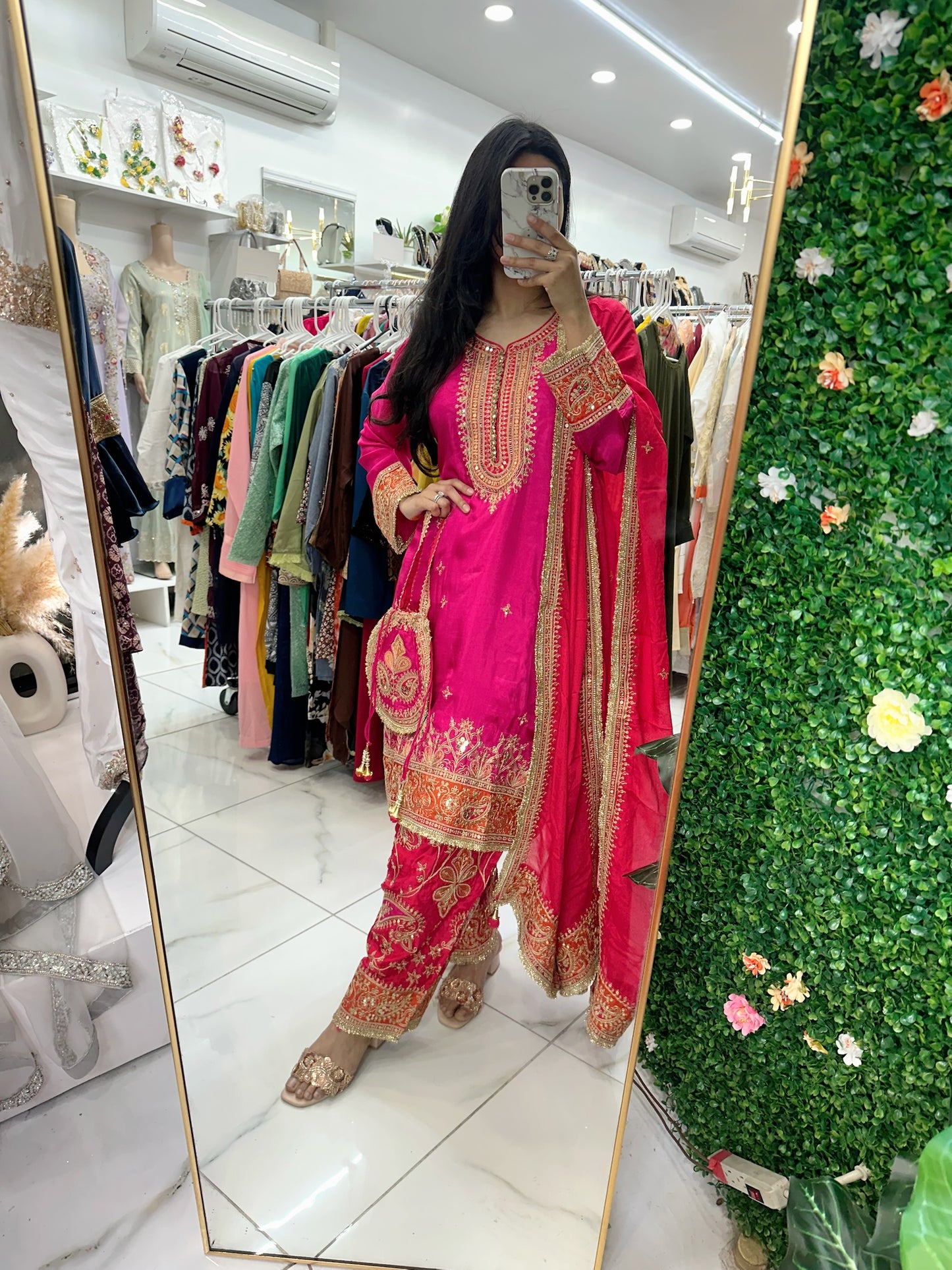 Hot pink fancy salwar kameez with potli bag