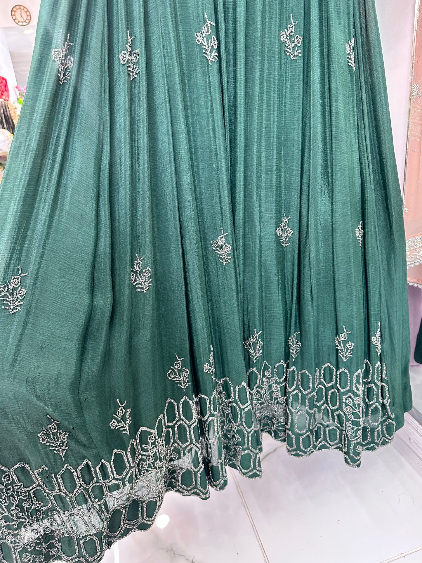 Green belted party wear gowm
