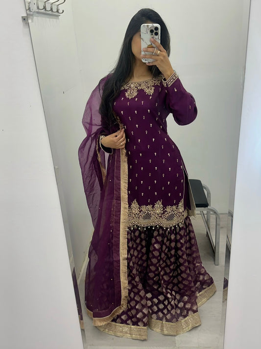 Party wear gharara in heavy hand work. Kameez shimmer organza with soft organza duppata & brocade zuthe katan gharara pant
