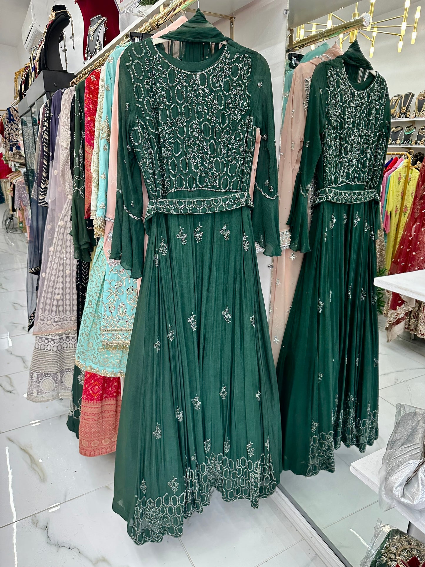 Green belted party wear gowm
