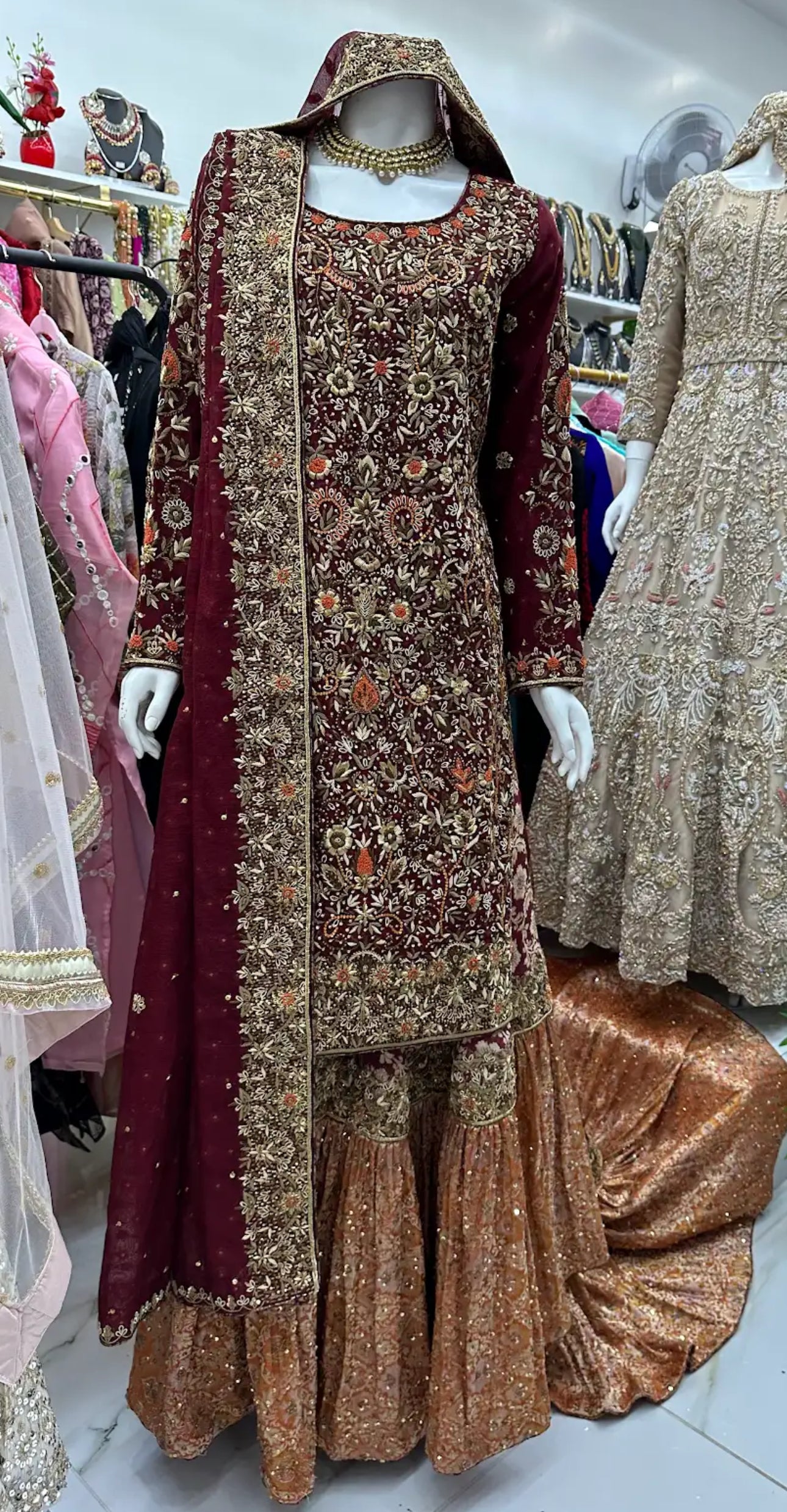 Burgundy bridal farsi lehenga with tail