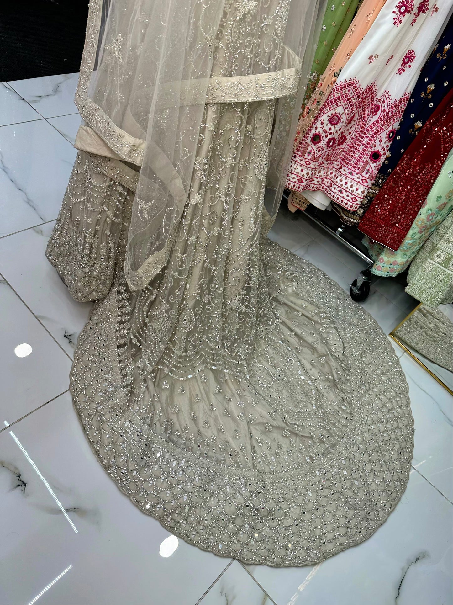 Light beige mirror work & stone bridal tail gown