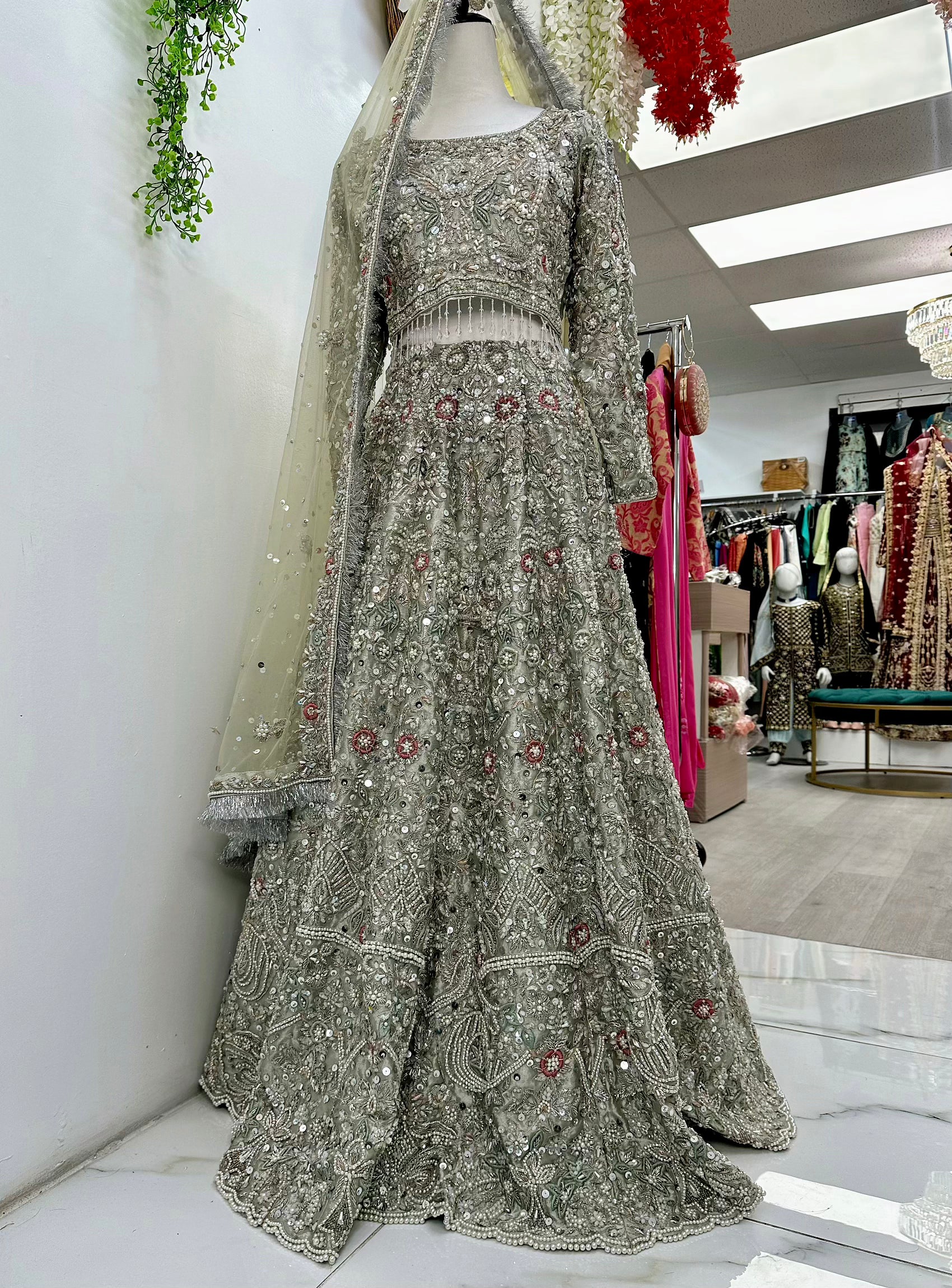 Bridal silver lehenga with heavy jewelry bead work Selina Habibti Attire Bridal silver lehenga with heavy jewelry bead work Selina Habibti Attire