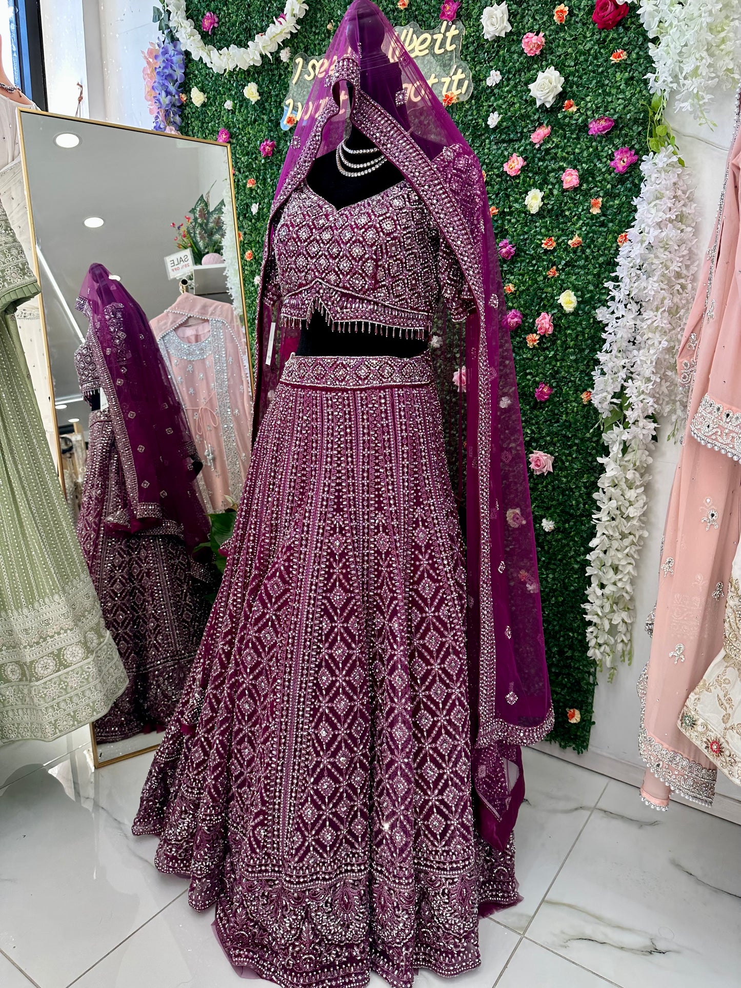 Deep plum heavy stone work bridal lehenga