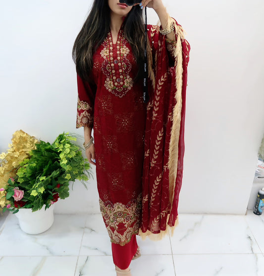 Maroon heavy embroidered lawn suit