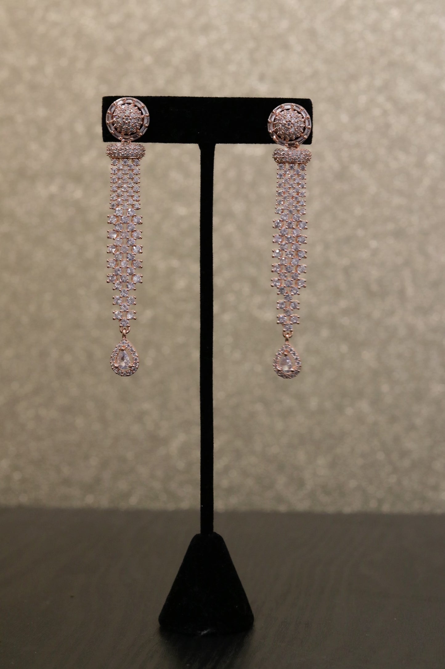 Long sparkly diamond cut earring