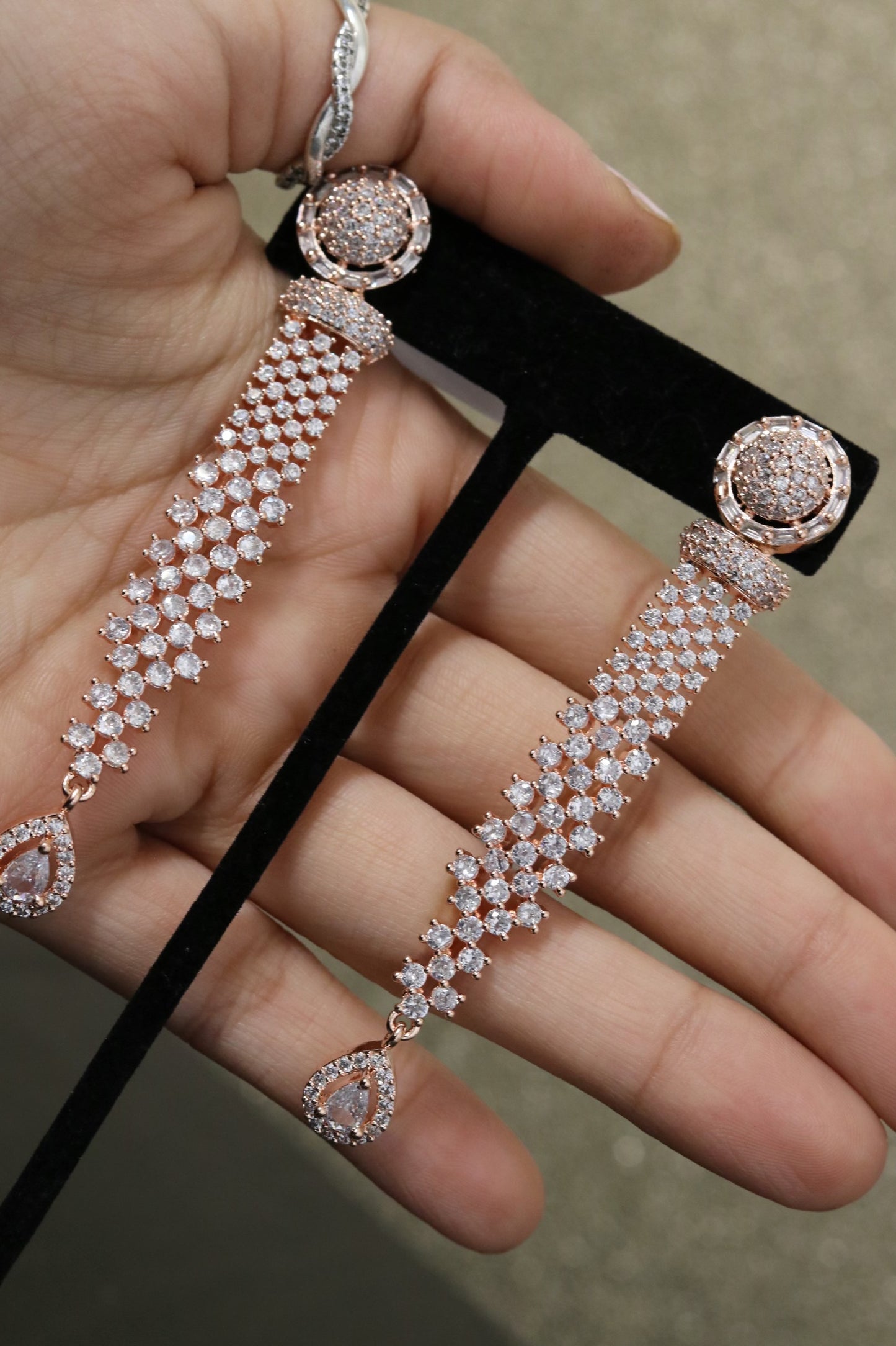 Long sparkly diamond cut earring