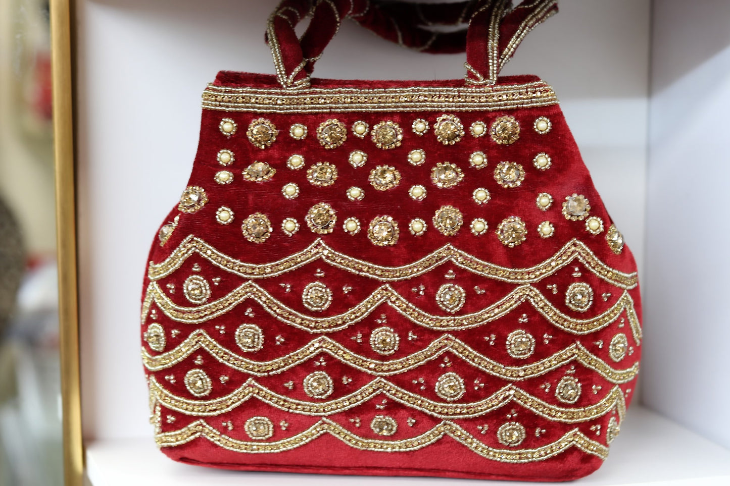 Maroon and gold party purse