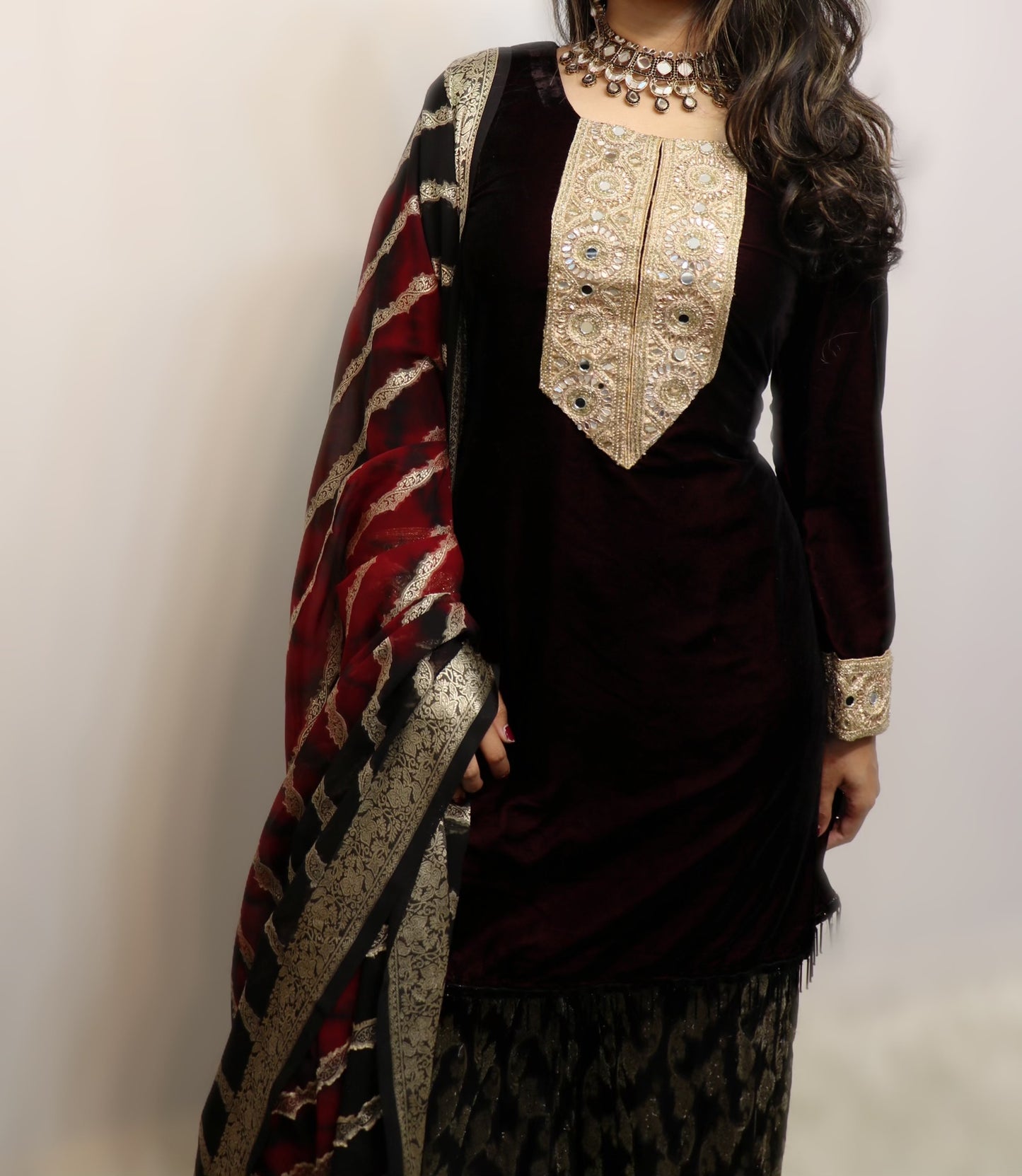 Dark maroon velvet suit with georgette banarasi
