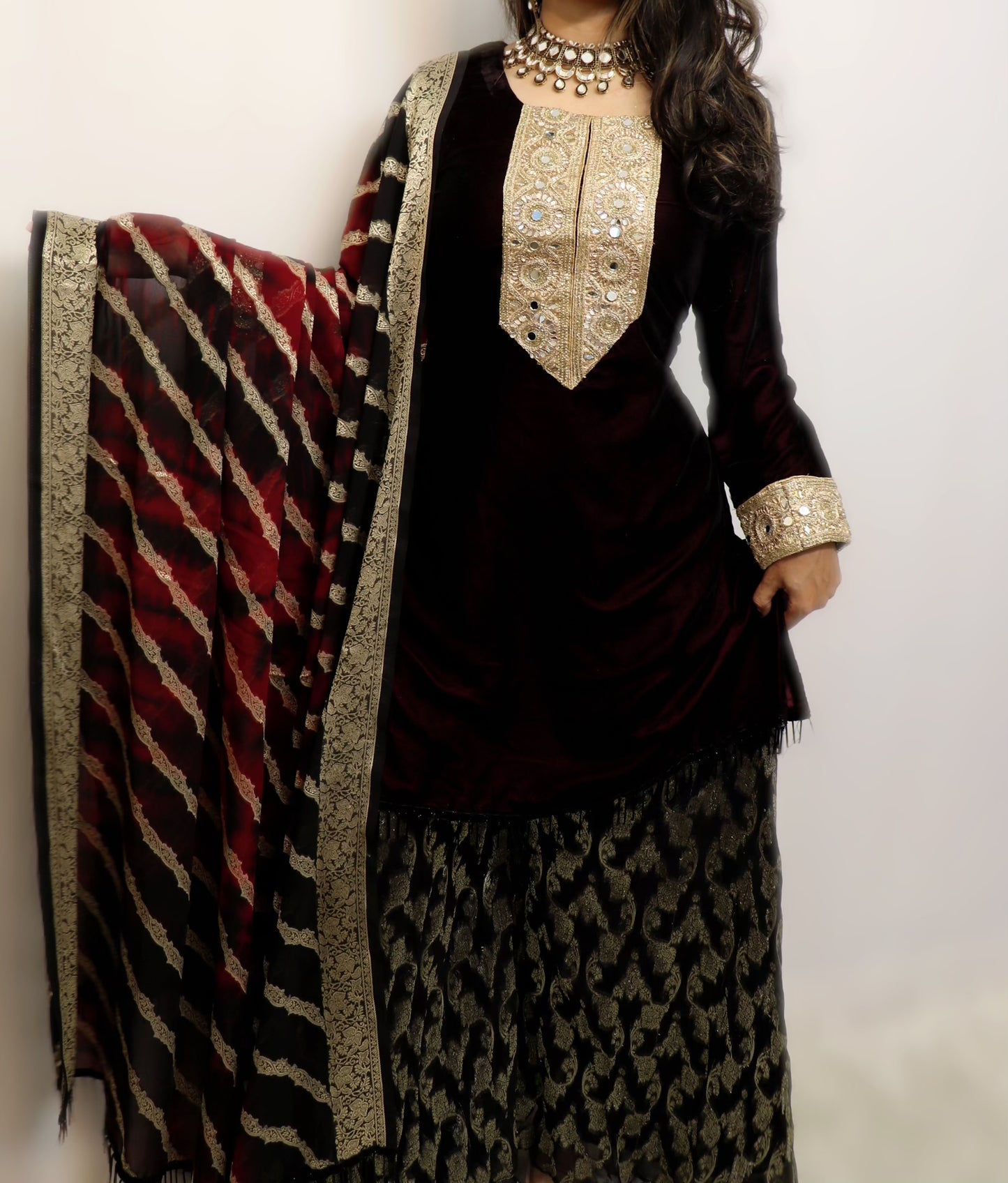 Dark maroon velvet suit with georgette banarasi