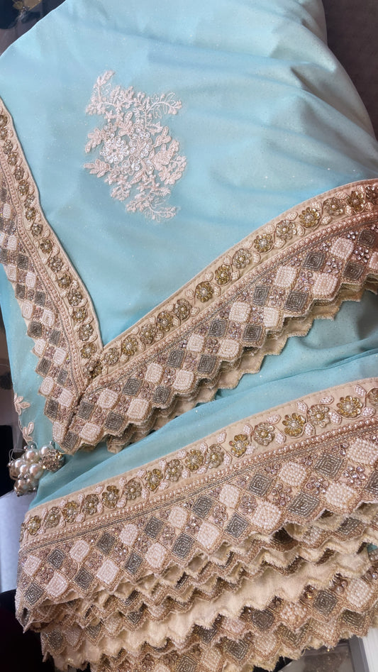 Light baby blue party saree with heavy border