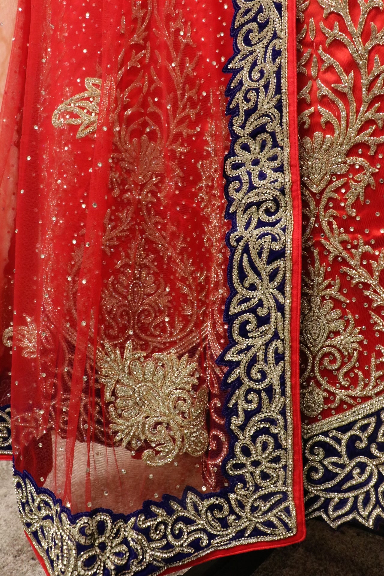 Heavy bridal stonework deep red & blue lehenga