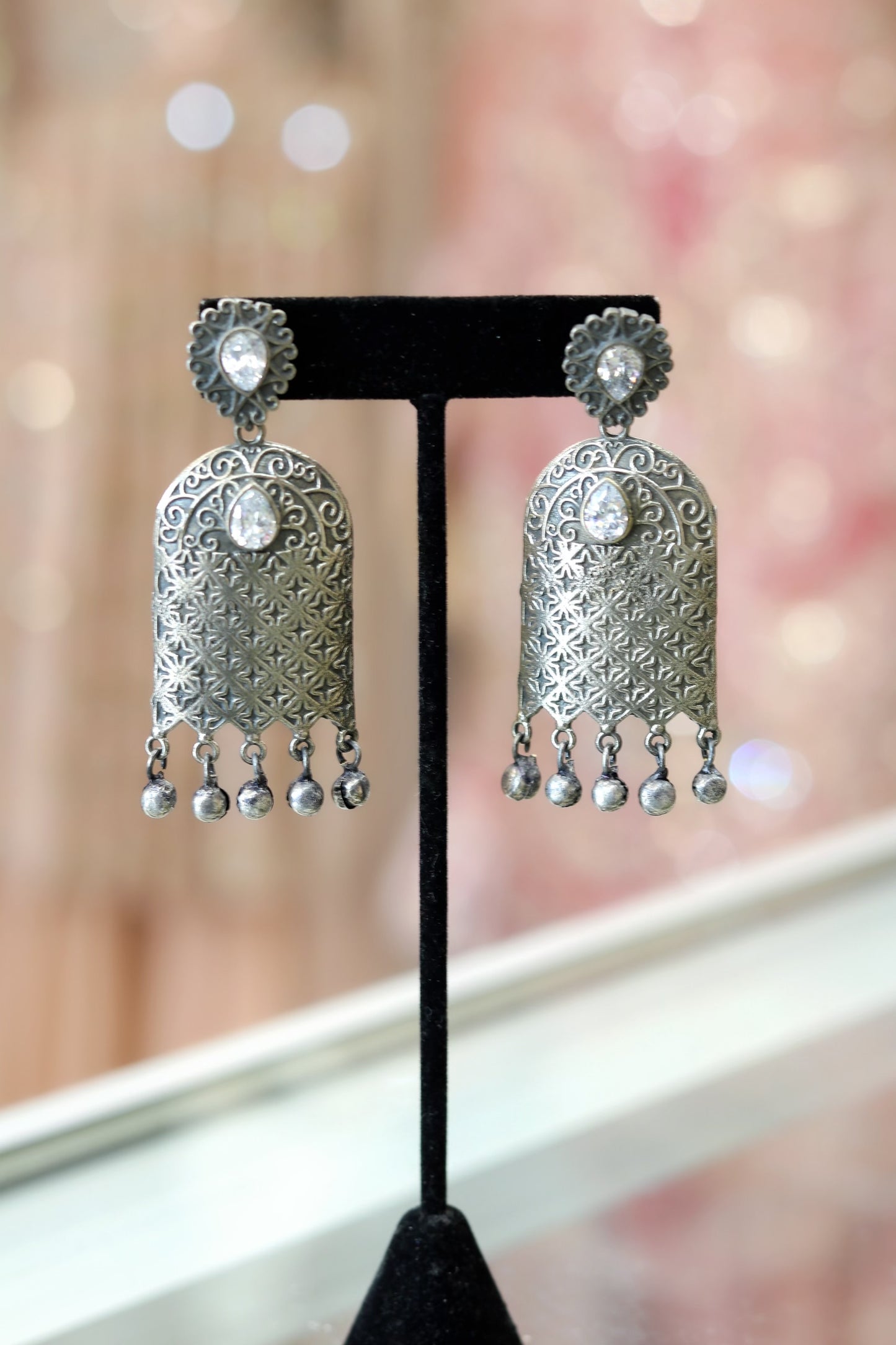 Unique oxidized earrings with clear stone