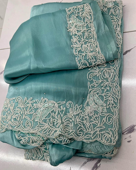 Shiny blue organza saree with pearl work