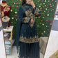 Dark green gharara suit