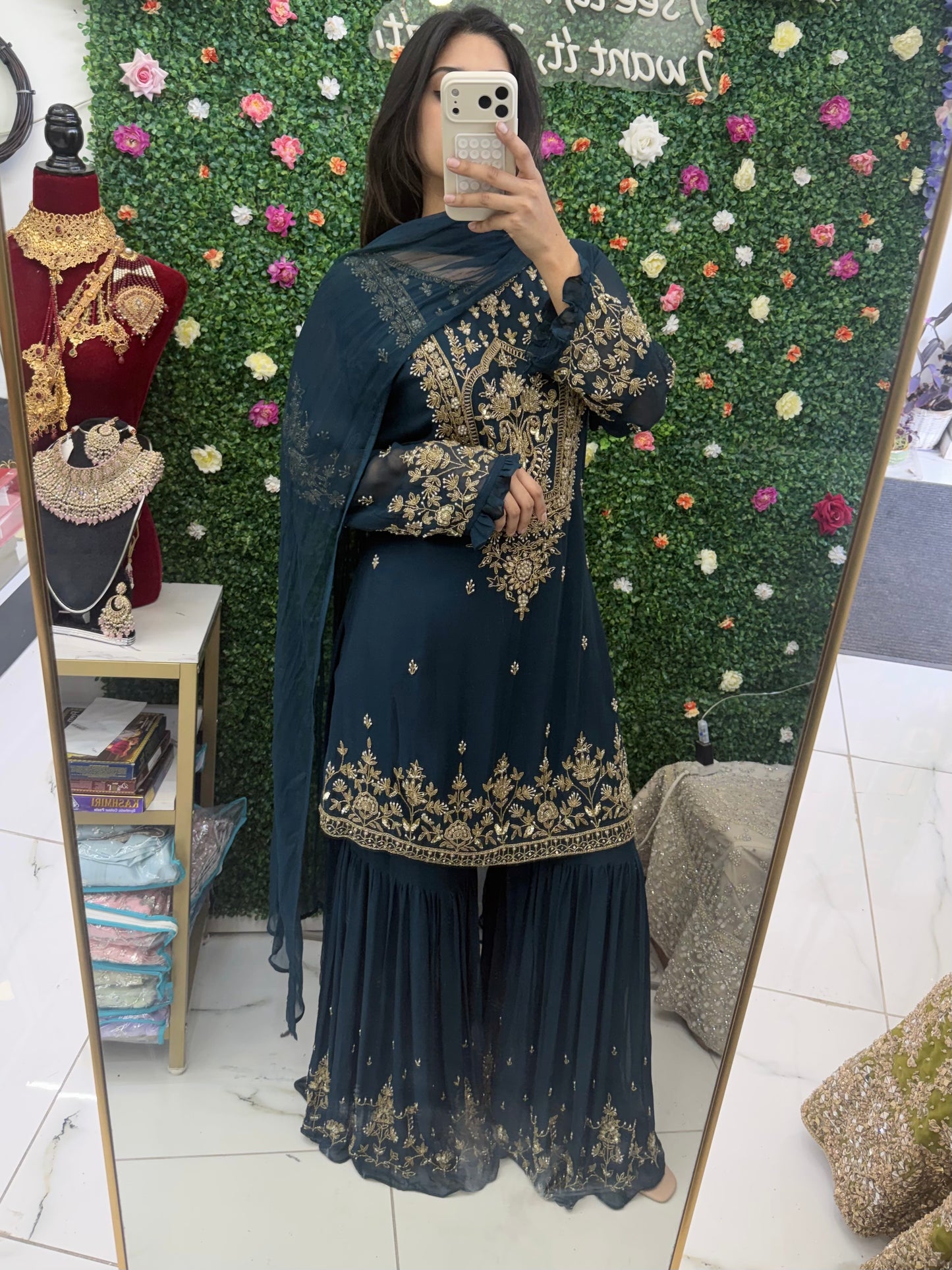 Dark green gharara suit