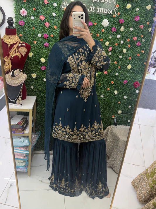 Dark green gharara suit