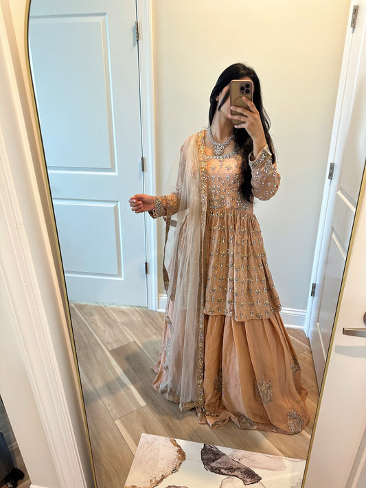 Nude pink peplum lehenga