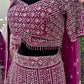 Deep plum heavy stone work bridal lehenga