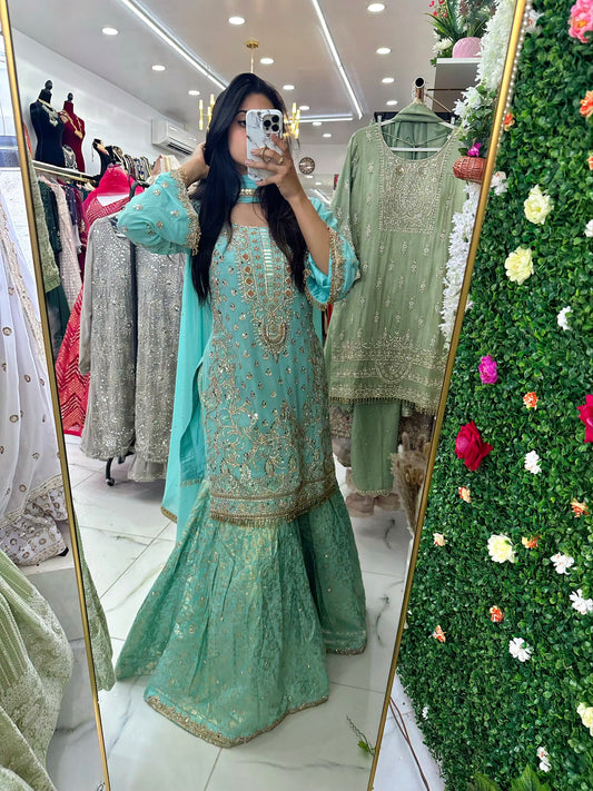 Heavy stone work blue gharara suit