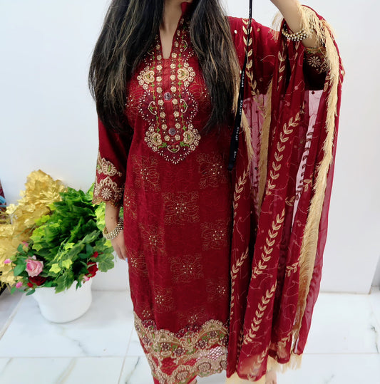 Maroon heavy embroidered lawn suit