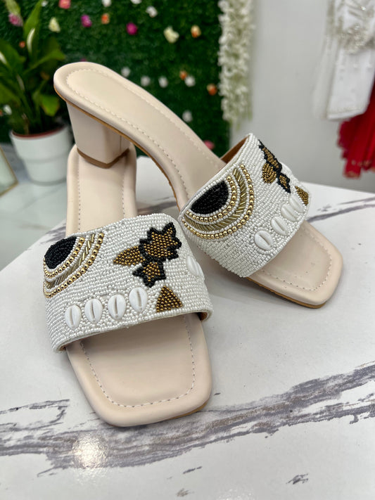 White heels with details with extra cushion comfort