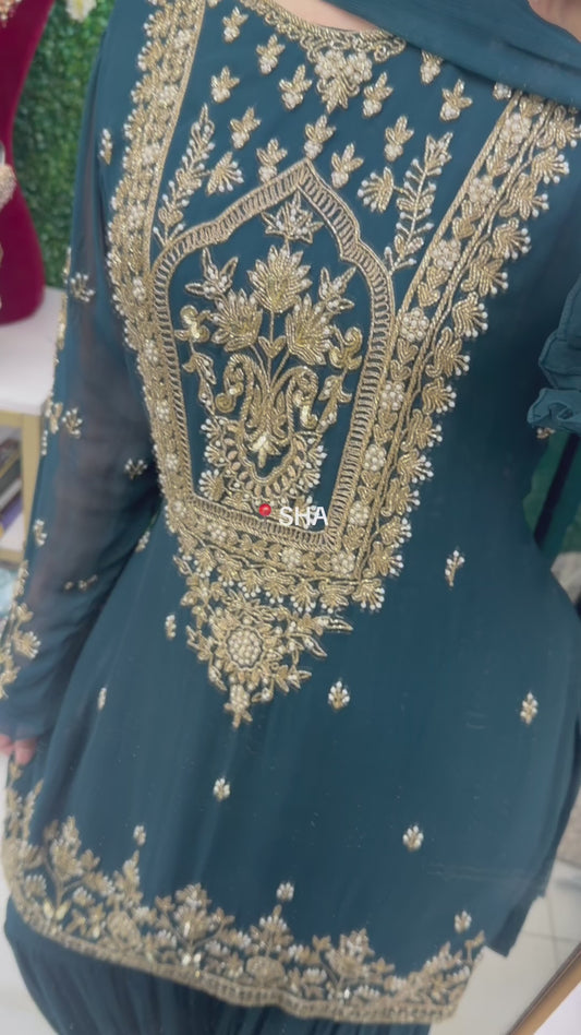 Dark green gharara suit