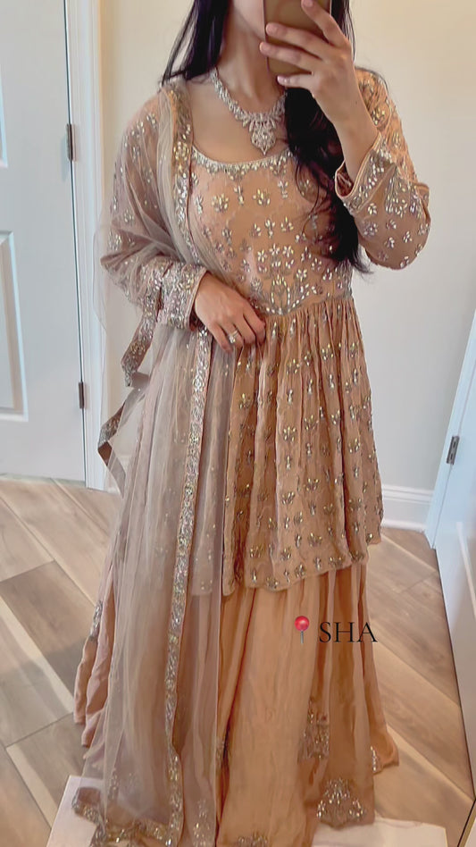 Nude pink peplum lehenga