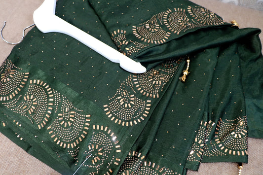 Sheer silk deep green party saree