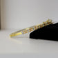 Thin gold tone bracelet