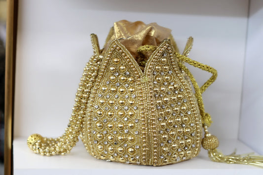 Gold over the top pouch purse