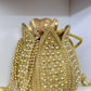 Gold over the top pouch purse