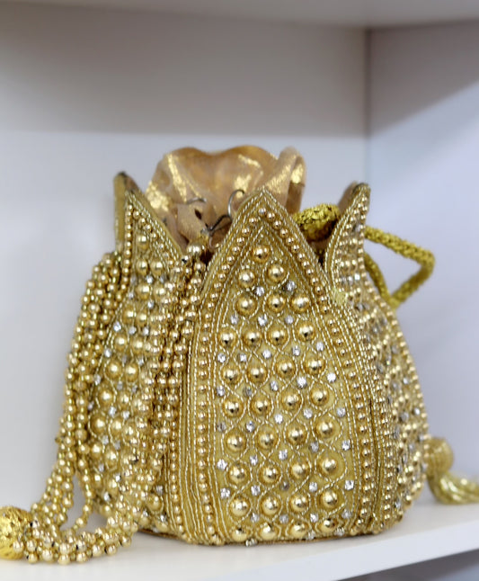 Gold over the top pouch purse