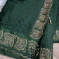 Sheer silk deep green party saree