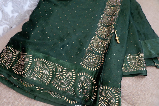 Sheer silk deep green party saree