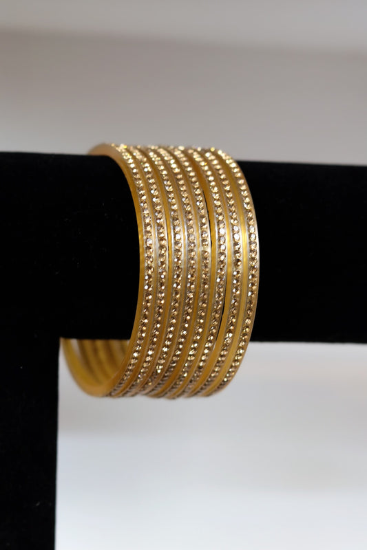 8 piece plastic gold stone bangles